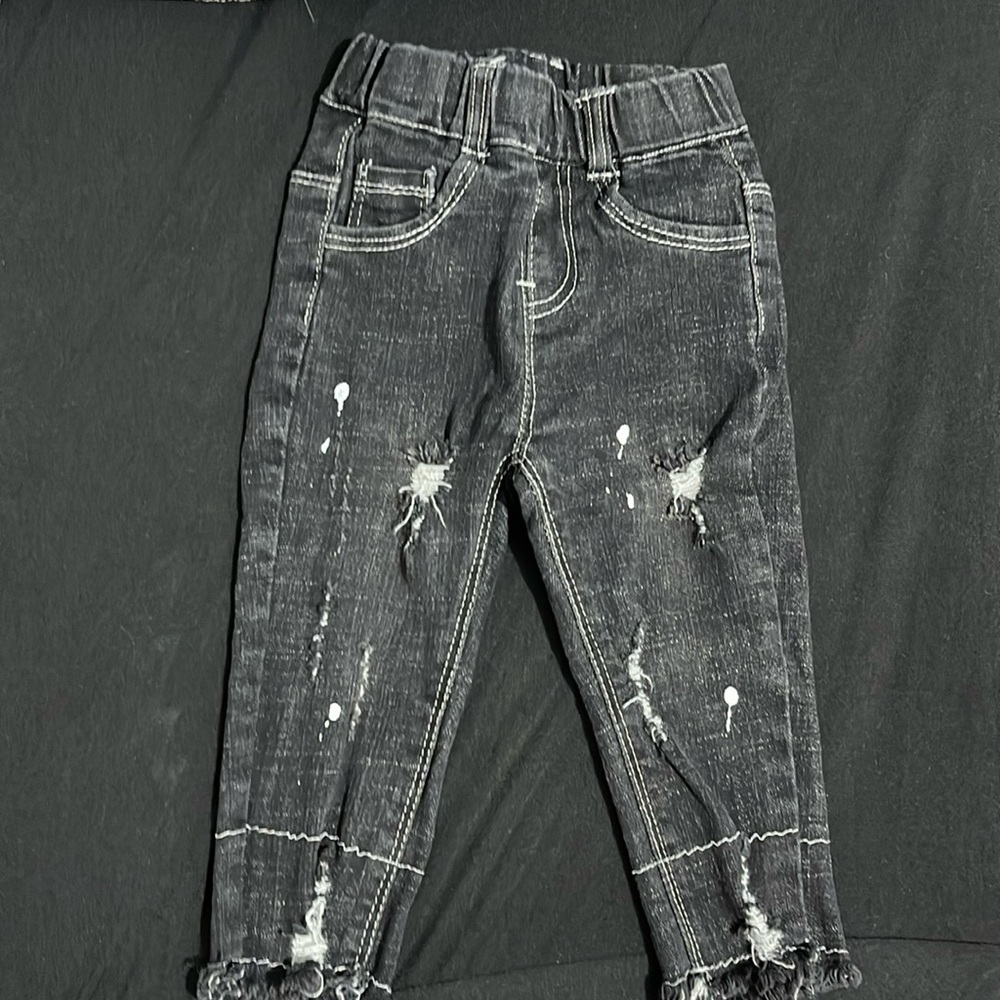 Black tie dye style jeans